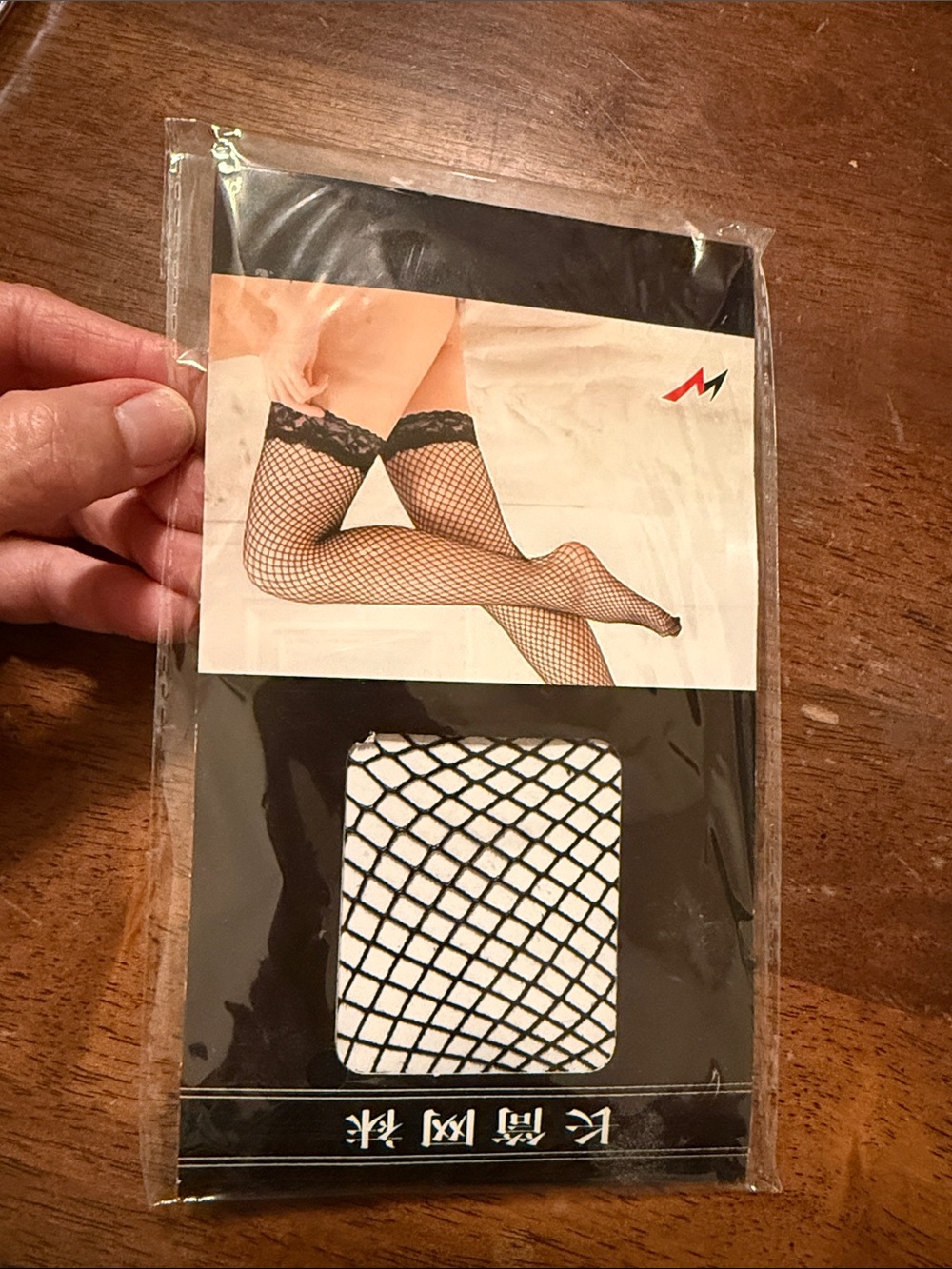 Black Fishnet Thigh-High Stockings with Lace Top